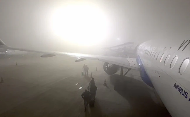 dense fog disrupts flights and freezes delhi in cold wave